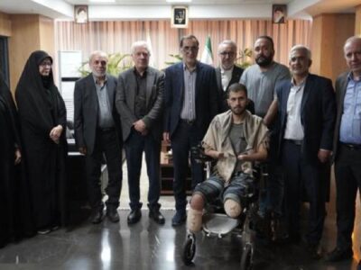 دیدار رئیس بنیاد شهید و امور ایثارگران با جانباز سرافراز حسین محمدی